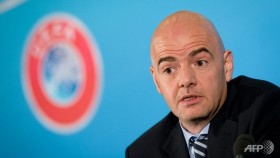 UEFA approves 10-game racism ban, blood tests