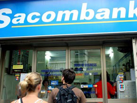 sacombanks h1 profit exceeds half of target