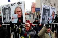 Russians march against anti-US adoption law