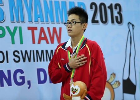 swimmer quynh to train using american system