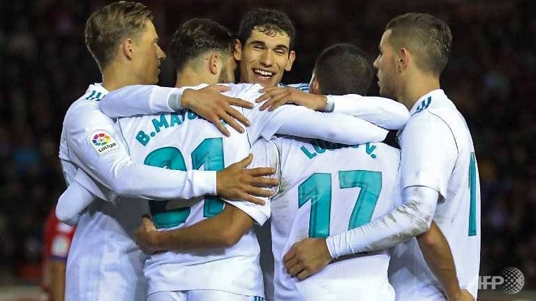 real madrid spot on while barcelona held to cup draw