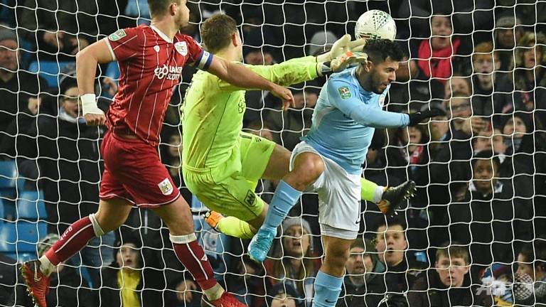 aguero to the rescue against valiant bristol city