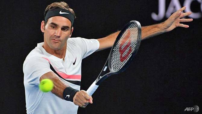 Federer shines as Djokovic survives brutal heat test