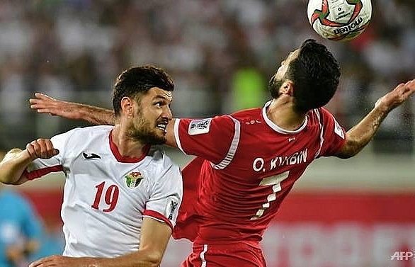 Jordan tame Syria to reach Asian Cup knockouts