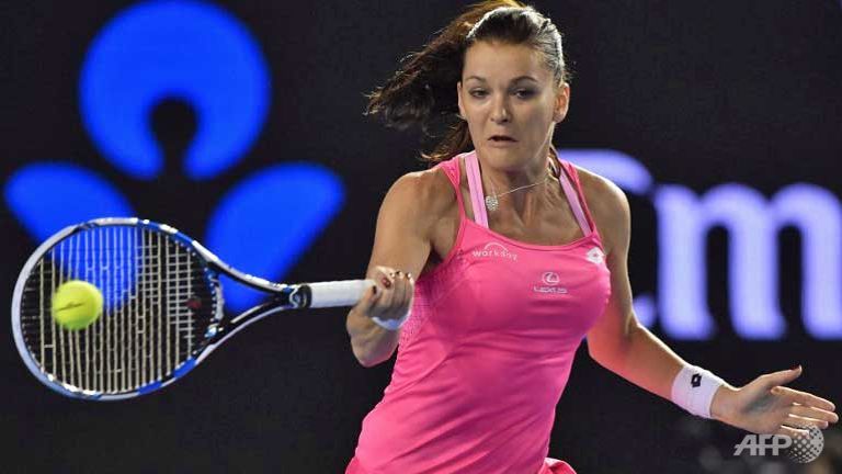 radwanska through as more seeds fall in qatar