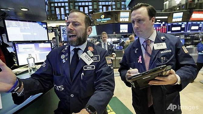 wall street plunges as dow erases 2018s gains