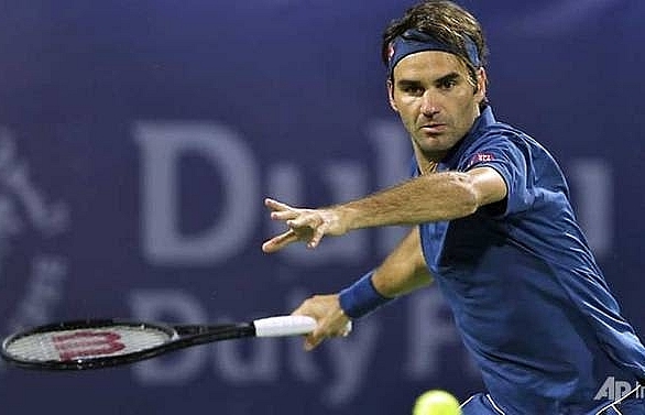 Federer starts 100th title bid with Kohlschreiber win in Dubai