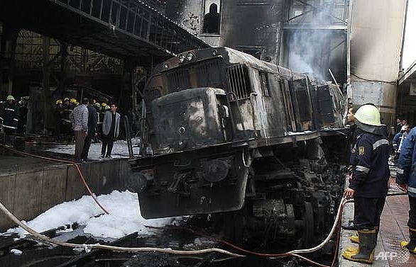At least 20 killed, 43 injured in crash and fire at Cairo train station