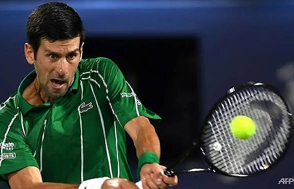 Djokovic continues hot streak to cruise into second round in Dubai