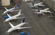 In-production Boeing 787 Dreamliner aircraft sit on the tarmac at the Boeing production facilities and factory at Paine Field in Everett, Washington. US aerospace giant Boeing said Thursday it had won an order from Kazakhstan flag carrier Air Astana for seven new aircraft, worth $1.3 billion at list value. 