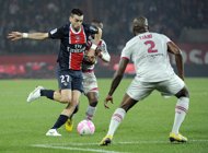 Paris Saint-Germain's midfielder Javier Pastore (L) vies for the ball with Bordeaux's Ciani Michael during the French L1 football match PSG vs Bordeaux at the Parc des Princes stadium in Paris. Paris Saint-Germain on Sunday failed to regain the top spot in Ligue 1, managing only a 1-1 draw at home against mid-table Bordeaux after Montpellier leap-frogged them by beating Saint-Etienne.
