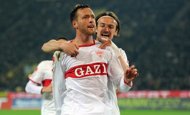 Stuttgart's Martin Harnik (L) and Christian Gentner celebrate after their German first division Bundesliga football match against Borussia Dortmund in the German city of Dortmund. VfB Stuttgart earned a dramatic 4-4 draw at German league leaders Borussia Dortmund as Gentner hit the equaliser in the 92nd minute.