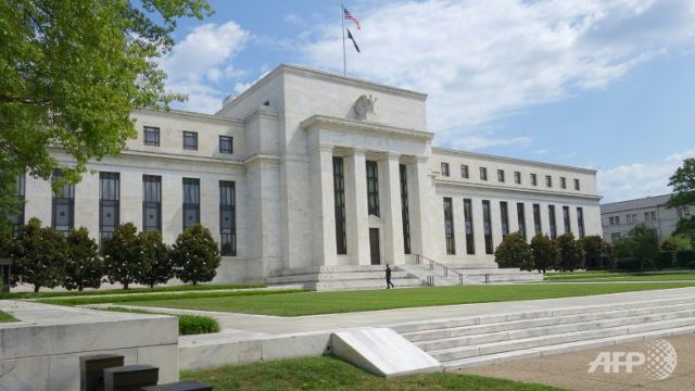 Fed raises benchmark interest rate by a quarter point