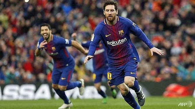 barcelona pull clear as messi brilliance edges out atletico