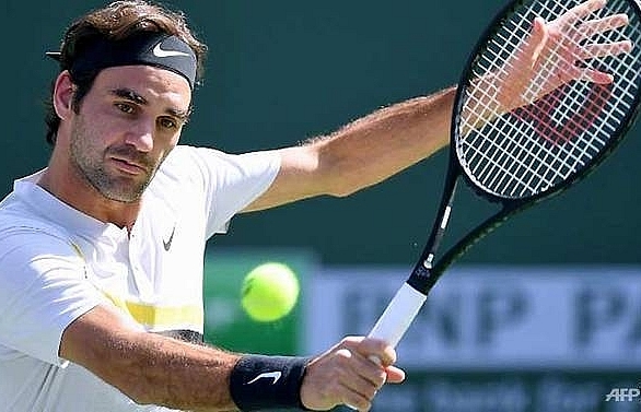 Federer rolls into Indian Wells fourth round