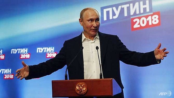 putin says will engage with west after record vote win