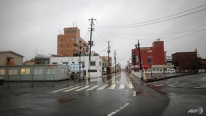 in fukushima ghost town a factory on the road to rebirth