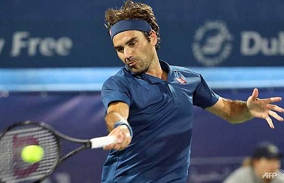 Federer two wins from 100th title after reaching Dubai semi-finals