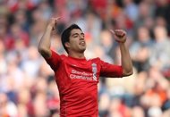 Liverpool's Luis Suarez, seen here during their English Premier League match against Wigan Athletic at Anfield in Liverpool, on March 24. Suarez insists Liverpool can end an indifferent season on a high by claiming a second trophy, ahead of their next match at Newcastle, on Sunday