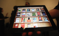 US sues Apple, publishers yield on e-book pricing