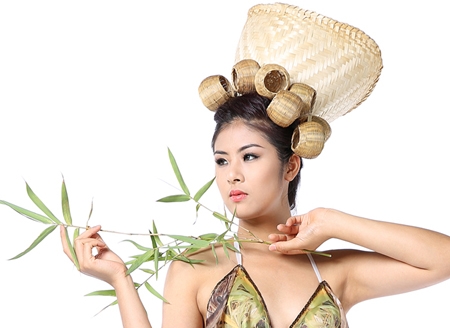 miss vietnam ngoc han performs in bamboo made clothes