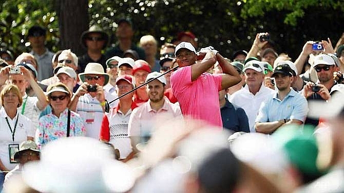 all eyes on tiger woods at masters practice as tension builds