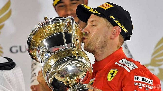 vettel marks 200th race with thrilling bahrain win