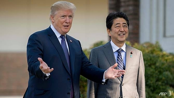 trump hosts abe with north korea trade on the agenda