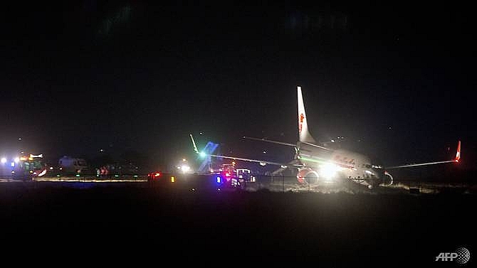 malindo airlines plane skids off runway in nepal