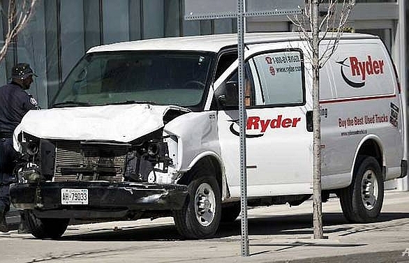 At least 10 dead after van ploughs into Toronto crowd