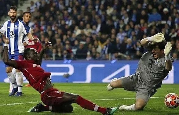 Liverpool seal semi-final date with Barcelona after strolling past Porto