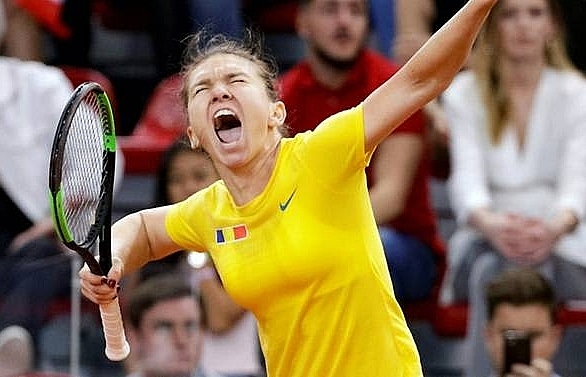 France edge Romania to set up Fed Cup final against Australia