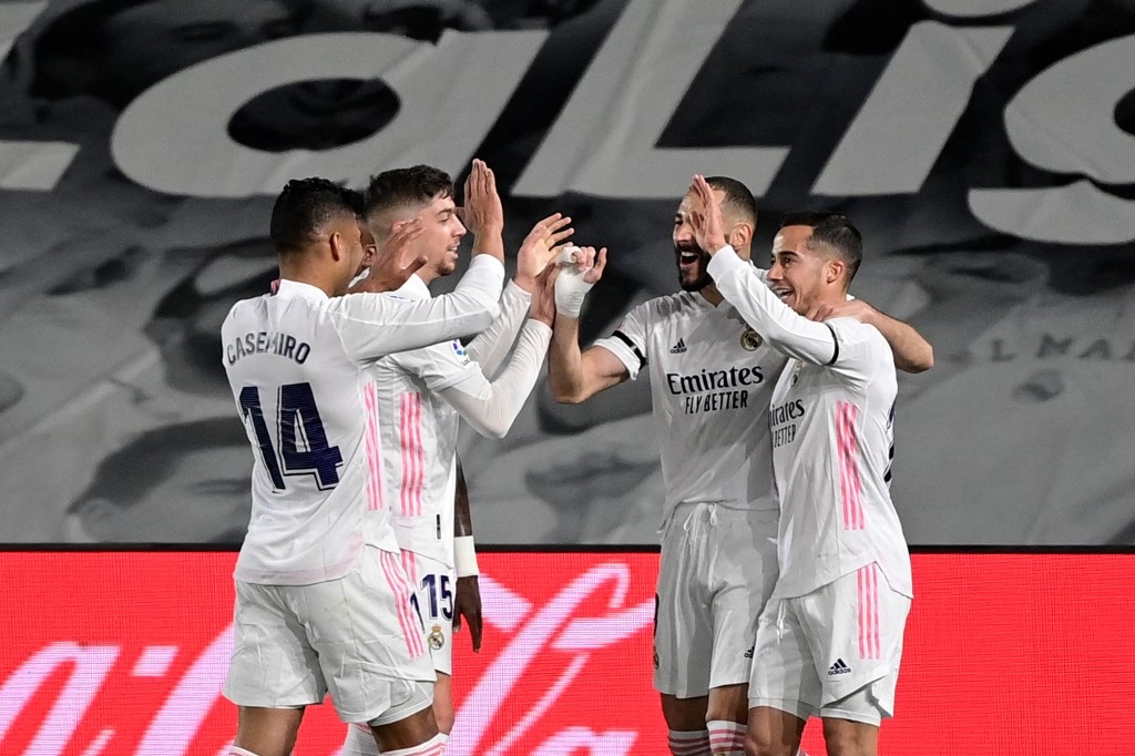 Real Madrid edge thrilling Clasico to go top of La Liga