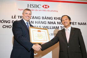first foreign banker to receive certificate of merit