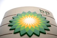BP profits slide on lower oil output