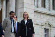 US Secretary of State Hillary Clinton is accompanied by the curator of Victoria Memorial Chittaranjan Panda as she leaves the Victoria Memorial Hall in Kolkata, on May 6. Clinton landed in India with hopes of reinvigorating a relationship seen as losing steam despite efforts to bring the world's two largest democracies closer