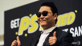 Gatecrasher style: Psy impersonator fools Cannes