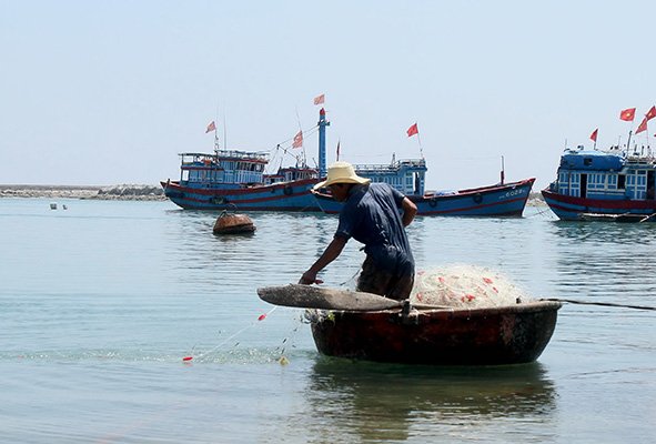 a master of bamboo basket boats