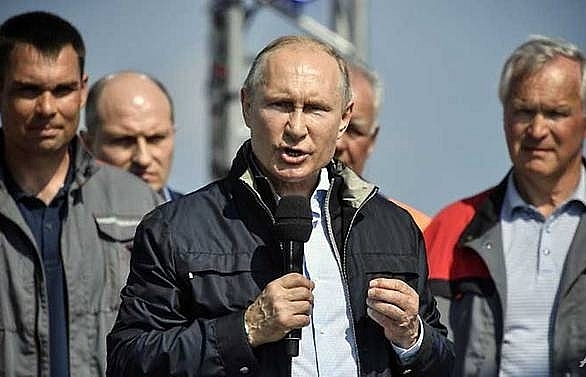 Putin opens new bridge to Crimea, provoking Ukraine, Western ire
