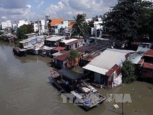 households along hcm city canals cant afford resettlement apartments