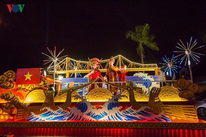 bright bridge float parade lights up danang at night