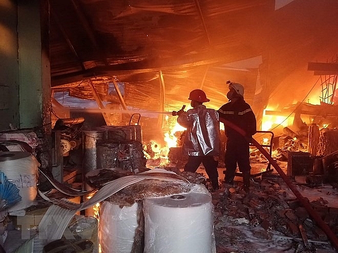 fire rips apart nearly 2000sqm factory in hcm city