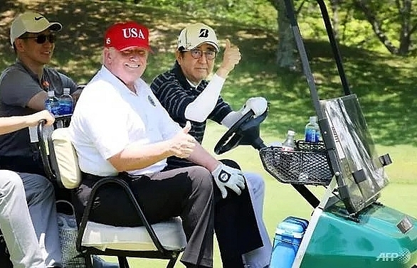After sumo and golf, Trump and Abe get down to business