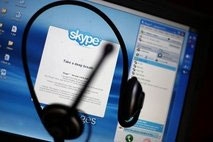 US cable TV giant adding Skype calls
