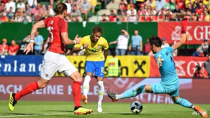 neymar scores stunner for brazil as ronaldo trains in russia