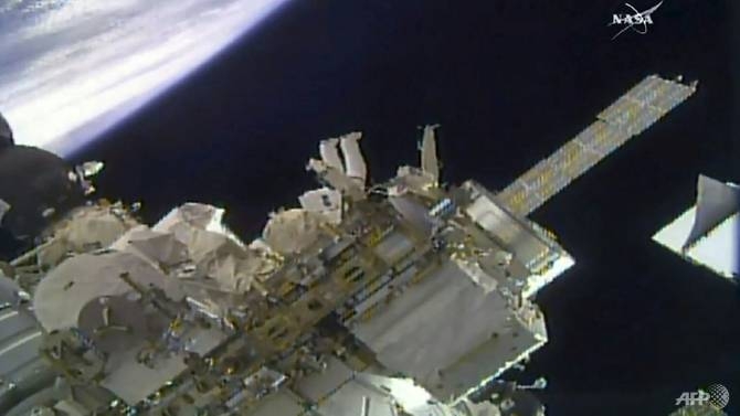 nasa astronauts install high def cameras during spacewalk