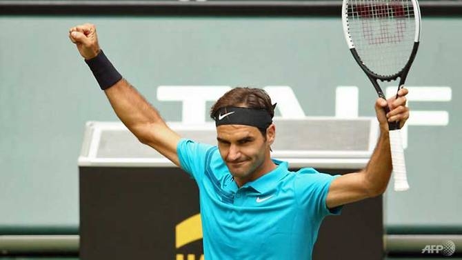 federer saves two match points to reach halle quarter finals