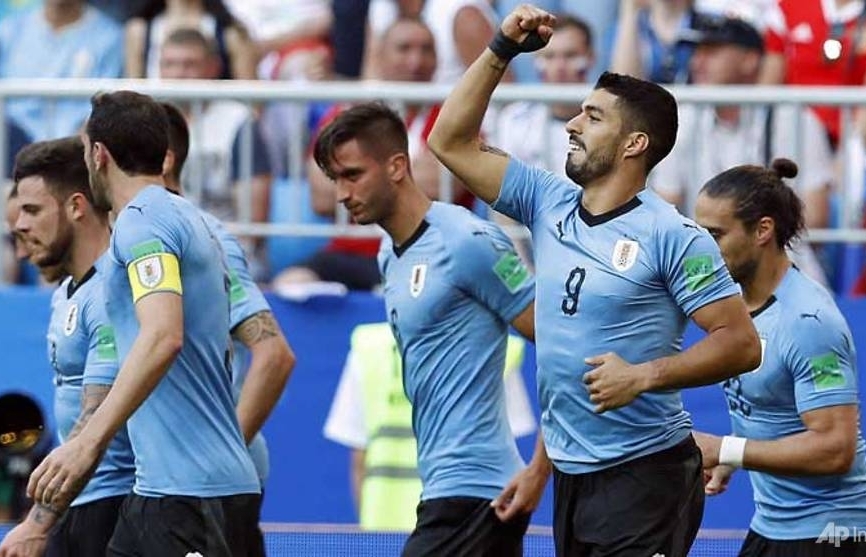 World Cup: Uruguay punish sluggish Russia to top Group A