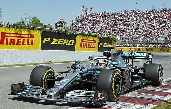 Hamilton takes controversial Canada win after Vettel penalised