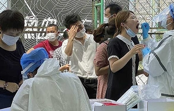 Beijing imposes partial travel ban, closes schools over coronavirus outbreak